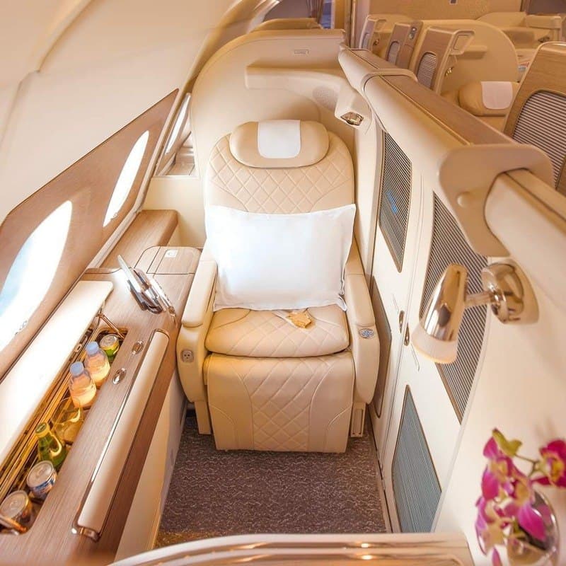 Business class cabin with lie-flat seats and premium finishes on an international airline